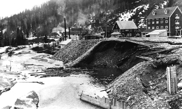 black and white photo of a caved-in mine entrance