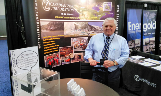 A man sitting at a booth. 