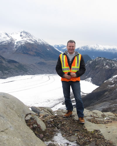 Bill Robertson is out in the field at a job site.