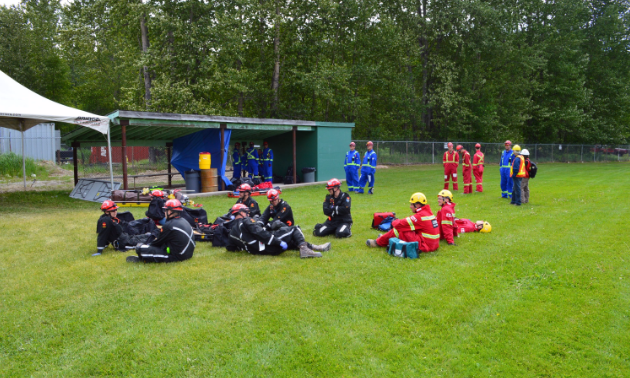A group of miners rests between activities at the 62nd Mine Rescue and First Aid Competition 