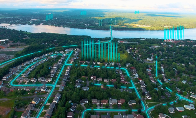 Graphic showing a cloud-based Energy System platform - an aerial view of a cityscape with green energy details.