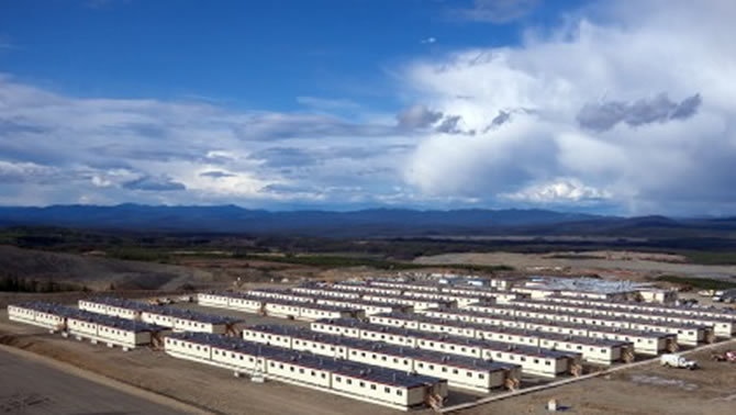 A picture of modular workspace accommodations, showing rows of trailer-like buildings. 
