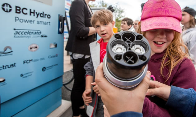 Frank J Mitchell students exploring the DC Fast Charging station. 