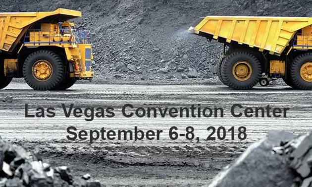 Dump trucks in a workplace with the conference dates in black lettering at the bottom