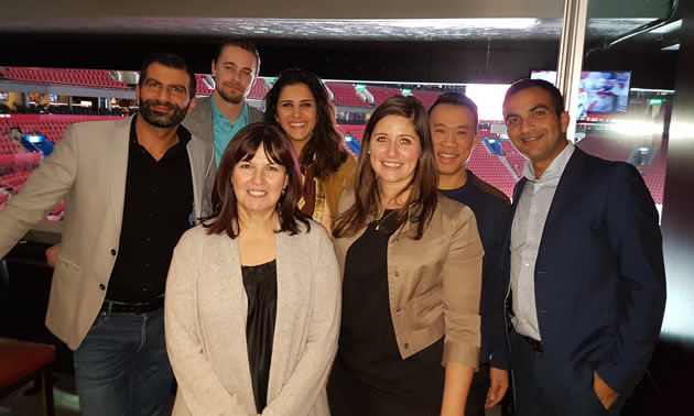 Part of the Progesys team with Riad Faour is on the right.