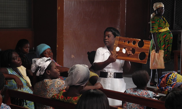 nurses and pregnant women in an African clinic