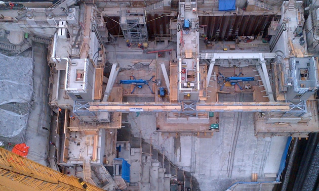 A an aerial shot of the upper part of the dam and the spillway area. 