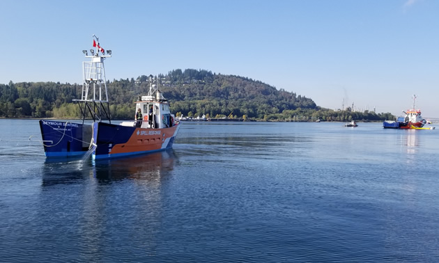 A spill response team in Burrard Inlet. 