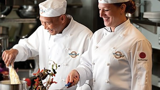 Two chefs preparing lunch