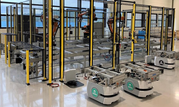 Automated work stations for making batteries. 