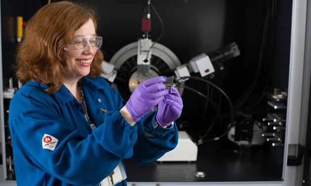 Heather Kaminsky is working in the lab.