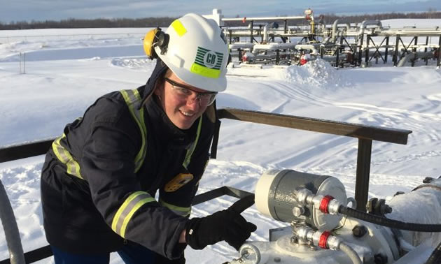 A worker maintaining a pump.