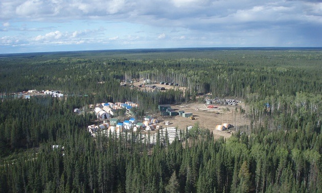 An Aerial view of Esker Camp & cliffs in forested area of Ontario.