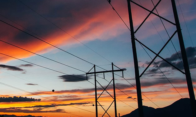 Silhouette of overhead power lines.