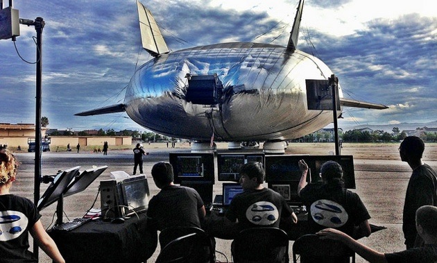 Engineers monitor systems data as the Aeroscraft taxis outside for the first time. 