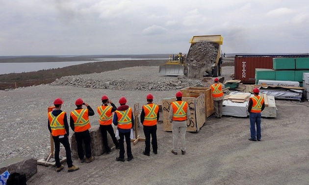 Patrick Evans and Jonathan Comerford, Director of Mountain Province Diamonds, on Gahcho Kue site visit, August 2014.