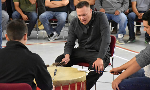Traditional Cree drummers from Moose Cree First Nation begin the festivities with a drum song.