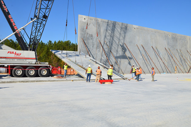 A wall of a concrete building going up in construction.
